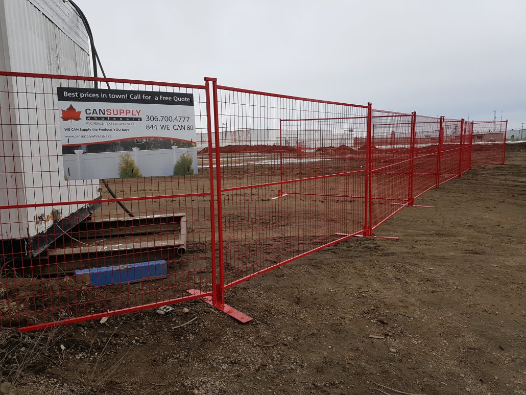 red fence around construction site