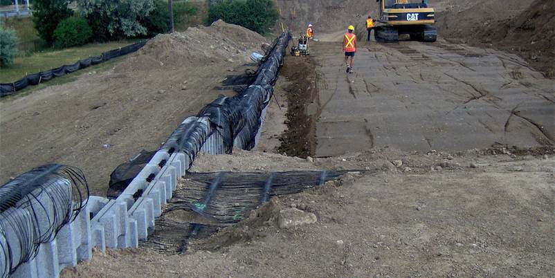 grading and construction of retaining wall