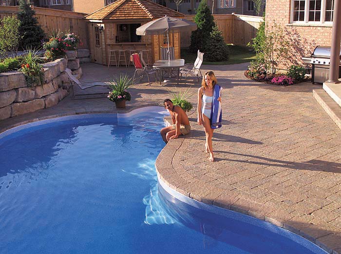 tiled backyard with pool