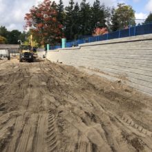 Precast retaining wall under construction