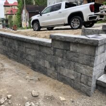 Precast retaining wall under construction