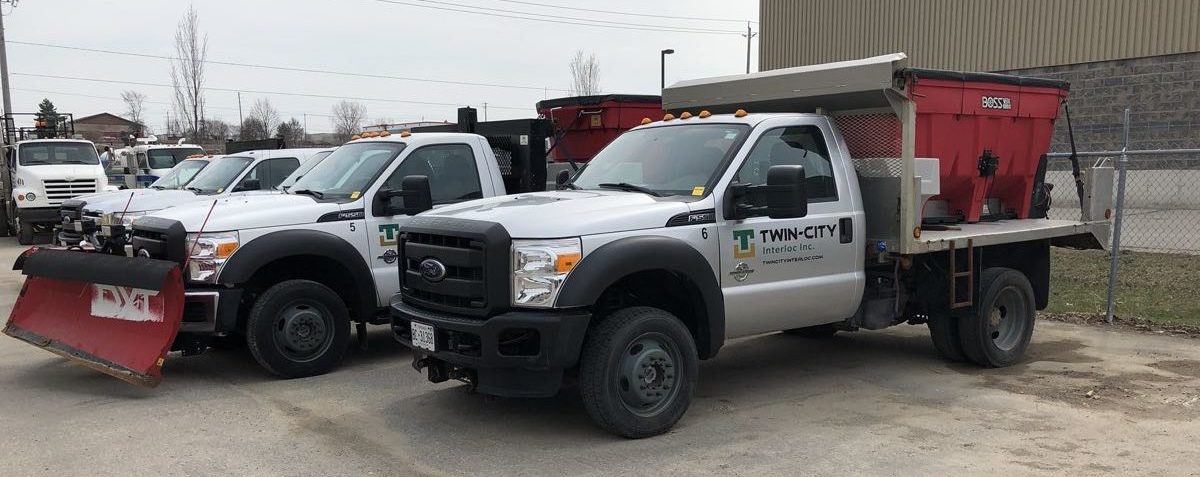 Twin City trucks for spreading salt and clearing snow