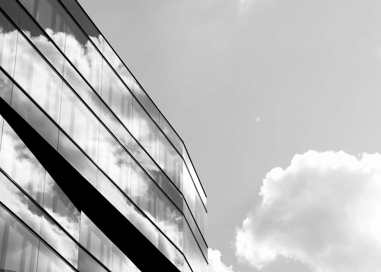 black and white picture of commercial glass building