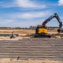 Summit Park retaining wall and construction equipment